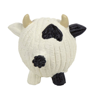 Back of squeaky ball shaped cow with black spots.