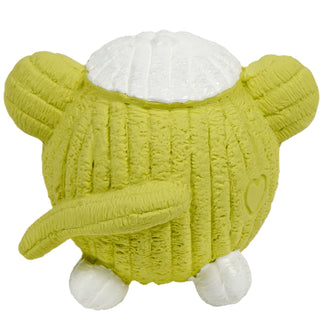 Back of squeaky sock monkey dog toy: has on a white cap, light tan skin and tail, with white feet.