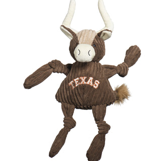 Texas Longhorn durable plush corduroy dog toy with knotted limbs, brown body, tan forehead, long white horns, brown fluffy end of tail, and "Texas" embroidered in downward curved style in white with orange boarder on front chest. Size large.