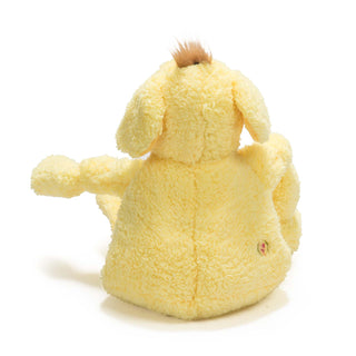 Back of dog shaped plush dog toy: has golden-yellow fur, and brown hair.