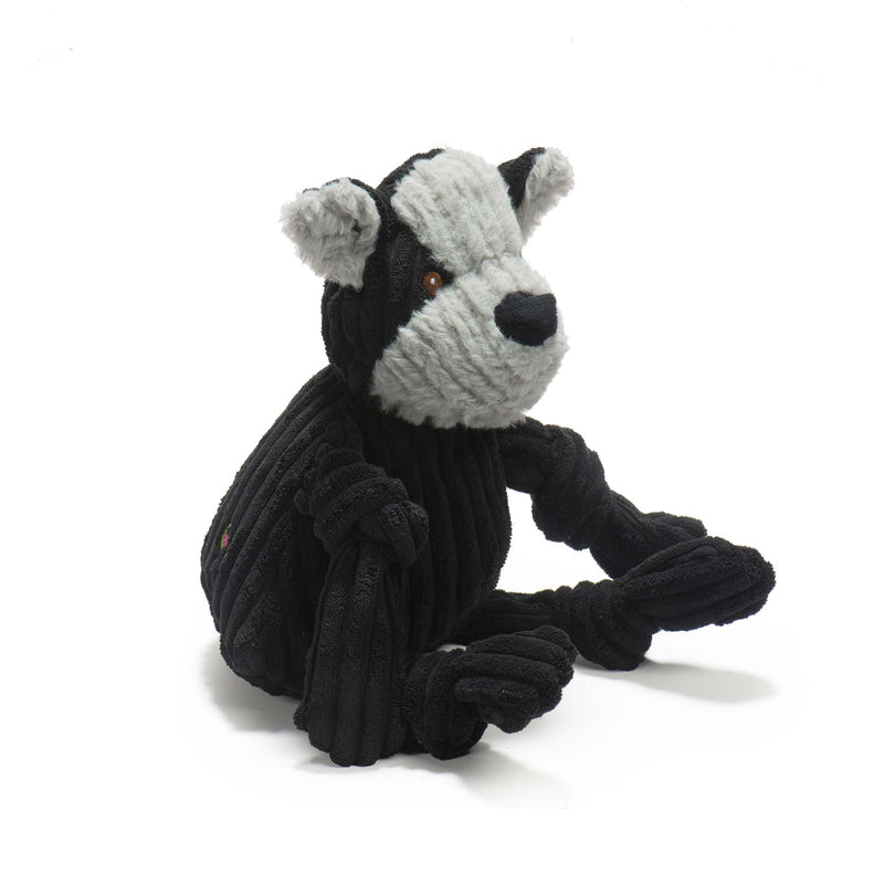 Side view of Bruiser HuggleMutt Knottie. Black dog with grey face and ears. Brown eyes and black nose.