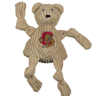 Cornell University Big Red Bear durable corduroy plush dog toy with tan fur, black eyes, white pupils, black nose, with the university logo on the chest. Size large.