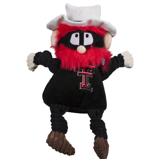 Texas Tech University Raider Red mascot durable plush dog toy with off-white hands and ears, shaggy red hair and beard, white top hat, bandit mask, brown shoes, and black corduroy knotted arms, legs, and shirt with University logo on front chest. Size large.