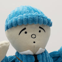 Close-up of face. Light colored skin with a blue hat on top of head. Expressive surprised face. Thumbnail