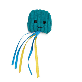 Teal blue jellie fish cat toy with teal blue corduroy head, black embroidered eyes and smile, and blue and yellow ribbons as tentacles.
