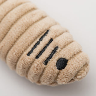 Close up of tan sardinie to show detail in embroidered gills and eye.