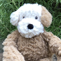 Lifestyle photo with Lulu pictured outside in grass. Thumbnail