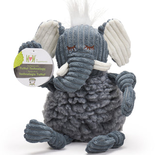 Elephant shaped durable plush dog toys with grey fluffy HuggleFleece® body, white hair, white inner-ear, white tusks, and is squeaky with knotted limbs. Size large.