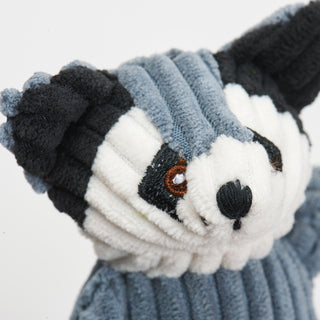 Close up of raccoon to show corduroy detail and embroidery detail.