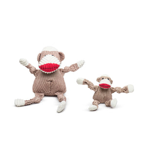 Set of two brown sock monkey durable plush corduroy dog toys with knotted limbs, red lips and white hands, feet, snout, and top of head in large and small.