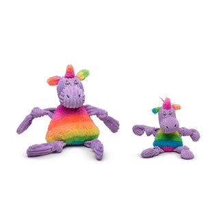 Two colorful unicorn toys on a white background