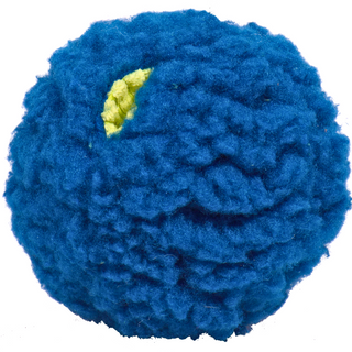 Close-up of the small blue treat-trapper ball, showing one of the three green holes designed to hide treats inside for your dog to discover.