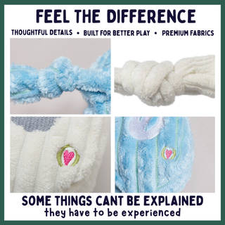 A promotional collage for a plush dog toy showing four close-up panels: a blue fuzzy rope loop, a white knotted rope section, a white ribbed section with a pink heart embroidery, and a blue ribbed section with a pink heart embroidery. Text at the top reads 'FEEL THE DIFFERENCE' and text at the bottom reads 'SOME THINGS CAN'T BE EXPLAINED they have to be experienced.