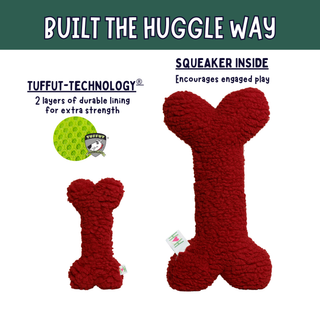Red bone-shaped plush dog toy shown in two sizes on a white background with marketing text. The larger toy is labeled 'SQUEAKER INSIDE Encourages engaged play' and the smaller toy is labeled 'TUFFUT-TECHNOLOGY 2 layers of durable lining for extra strength.