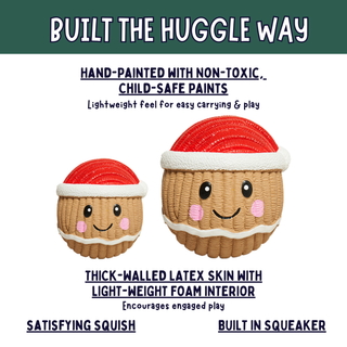 Two hand-painted coookie like huggie toys with red and white Santa hats, shown on a white background with promotional text. The text highlights child-safe hand-painted colors, thick-walled latex skin, light-weight foam interiors, and a built-in squeaker.