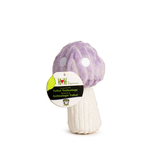 Lavender colored mushroom, with white polka dots, and a cream colored stem. 