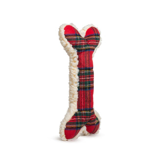 Angled side view of the HuggleFleece® Bone showing red tartan front, white fleece trim, and bone shape.