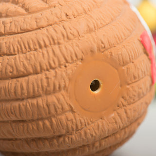 Bottom view of the squeaker for the brown ruff-tex gingerbreadman