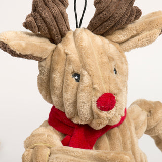 Side view close-up of Rudy Reindeer Knottie's face with red glittery nose and brown corduroy antlers.
