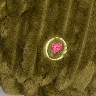 Close-up of Milo Moose's stitched pink heart detail outlined in green on olive corduroy fabric.
