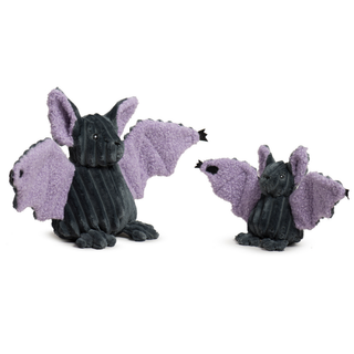 Two small bat figurines on a plain white background, one larger and one smaller, both with dark charcoal bodies and pale lavender wings.