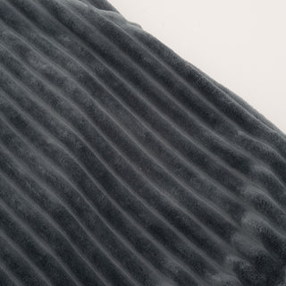 Close up view of charcoal colored blanket. 