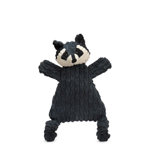 Dark gray triangle shaped raccoon corduroy plush dog toy with white face, black inner ears and around eyes, dark gray strip down forehead, knotted legs, short stubby arms, and brown embroidered eyes.