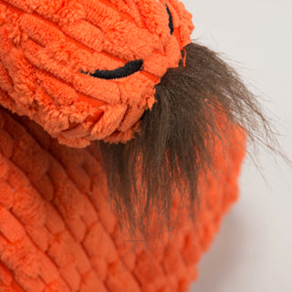 Close up of brown beard tuft on chin.