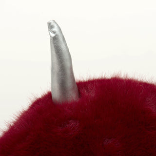 Close up of metallic silver horn on Noel Narwhal.