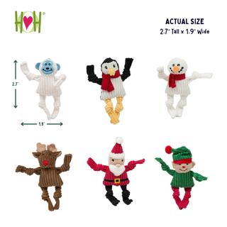 Six HOH brand plush dog toys shaped like holiday characters, including a blue monster, penguin, snowman, reindeer, Santa Claus, and elf, shown on a white background with text indicating actual size 2.7' tall x 1.
