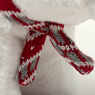 Close up of red nordic print scarf on Squooshie™ Polar Bear.