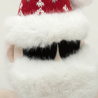 Close up of sunglasses on Beach Bum Santa surrounded by fluffy white beard and hat.