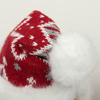 Close up of red nordic print fabric on hat to show texture.