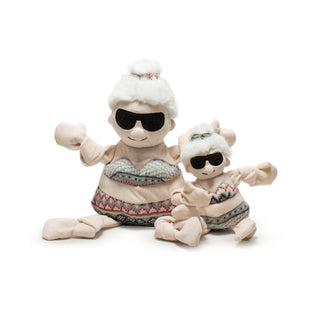 Set of two Beach Babe Mrs. C Knottie® plush dog toys: pale skin tone body and knotted arms with gray nordic print bikini and hair scrunchie, fluffy white hair in bun, big sunglasses on face and embroidered black smile.