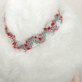 Close up of Mrs. C's fluffy white hair in bun with gray and red nordic hair scrunchie.