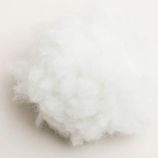 Close up to show texture of white HuggleFleece® cat toy.