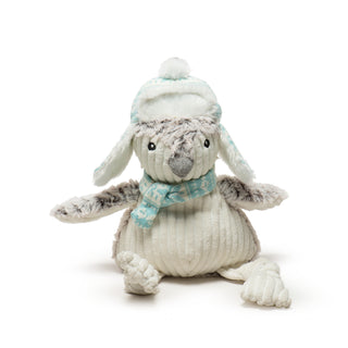 Large size white corduroy stomach, face inside of wings, and knotted legs, fluffy gray back, head, and wings, aqua and white Nordic print scarf and trapper hat with fluffy white fabric on the inside of hat and pouf ball on top.