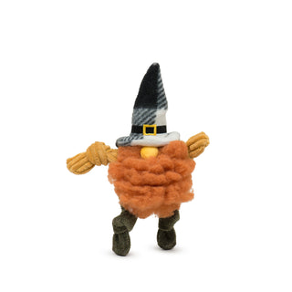 Gnome WeeHuggle® plush dog toy with yellow knotted arms, olive green knotted limbs, fluffy orange beard with yellow button nose poking out from underneath black and white pointy hat with gold buckle.