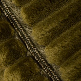 Close up view of olive green bed zipper to show fabric's soft texture.