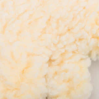 Close up image of HuggleFleece® texture on shamrock durable plush dog toy. 