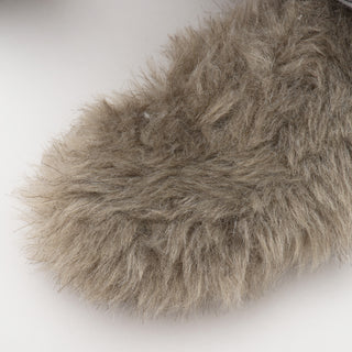 Image of gray fluffy tail the Festive fox shaped durable plush dog toy has. 