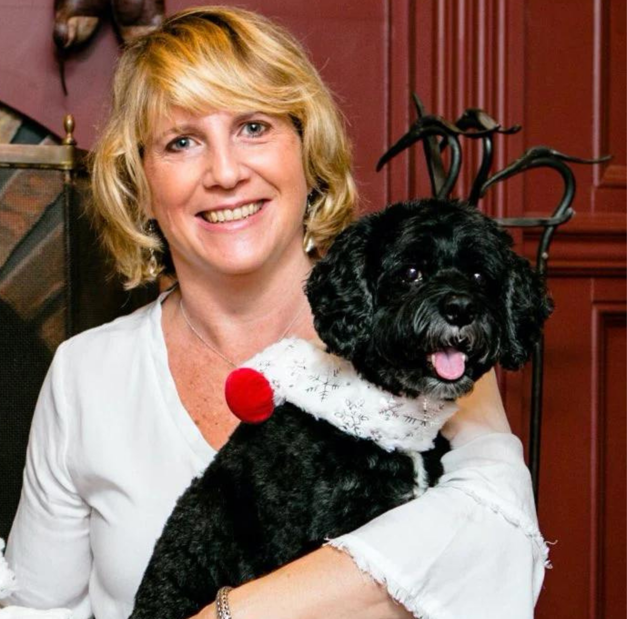 Beth Moran, Director of Operations, posed with dog, FinnBar.