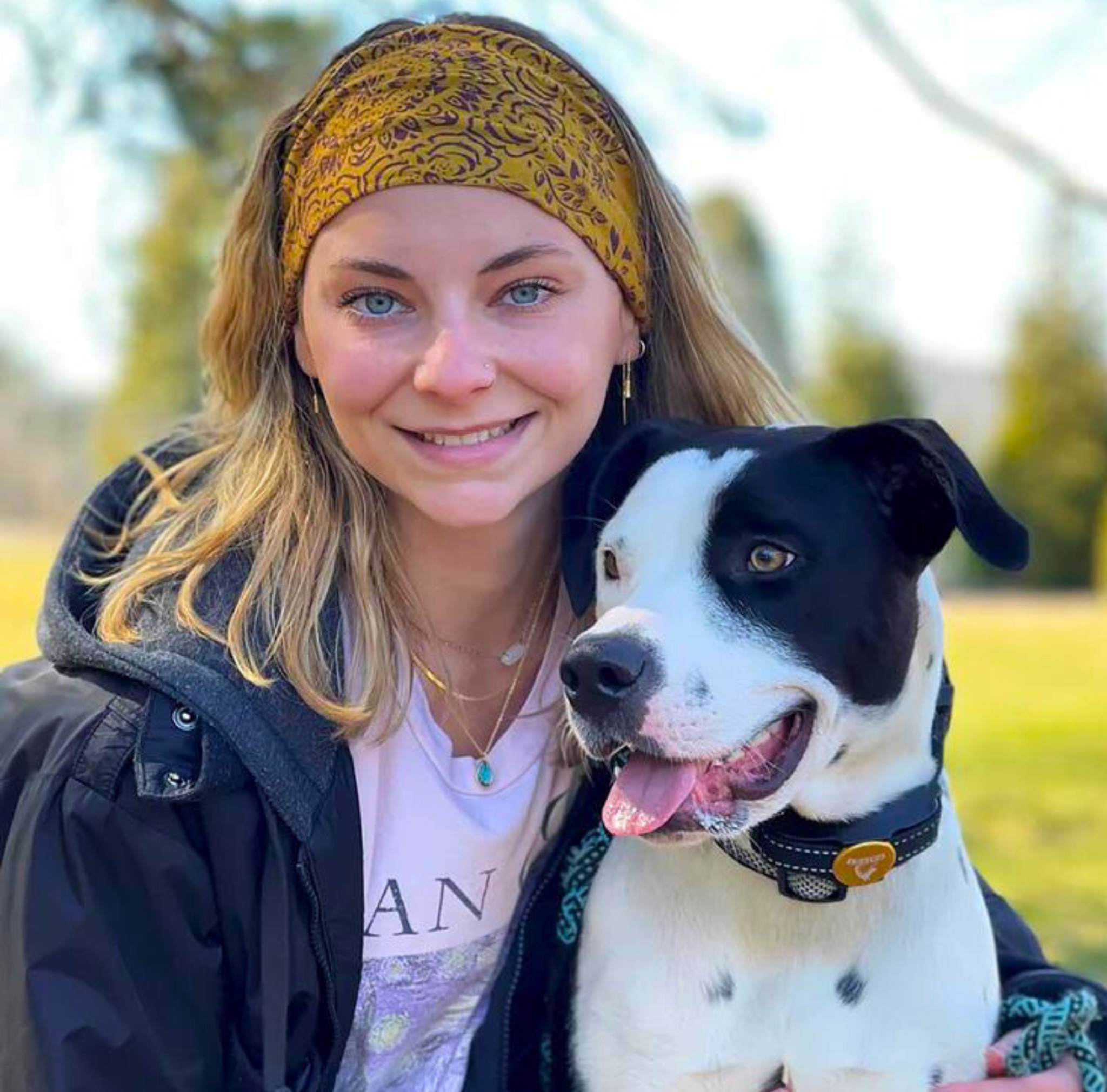 Jill Pace, Associate Marketing Manager, Trade, posed with dog, Miley