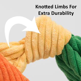 Close up of knotted limb of Knottie® durable plush dog toy with text "Knotted Limbs For Extra Durability"