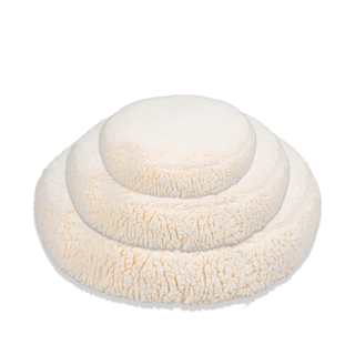 Set of three natural colored fluffy beds from largest to smallest in ascending order. 