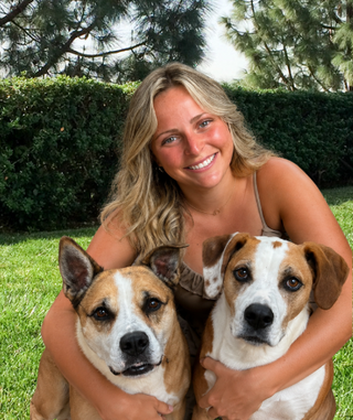 Girl with her two dogs