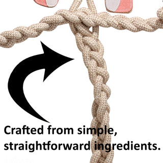 Close up of the body of a Natural Rope Knottie® dog toy with text "Crafted from simple, straightforward ingredients".