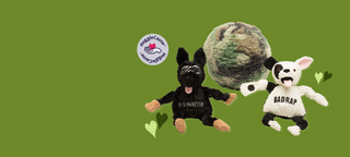 Olive green background with HuggleCause logo and HuggleCause dog toys: WCC Camo HuggleFleece® Ball, Project K-9 Hero Mattis Knottie®, and BadRap Jonny Justice Knottie®. Positioned right center.