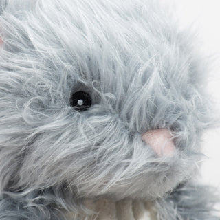 Close up of Birch Bunny's face to show facial details and embroidered eye.