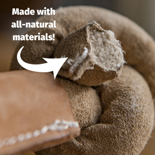 Close up of HuggleHide® Leather Bone with text "Made with all-natural materials!"